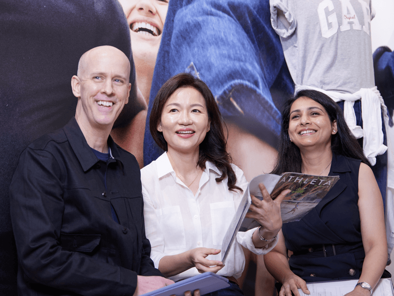 Three Employees Smiling 