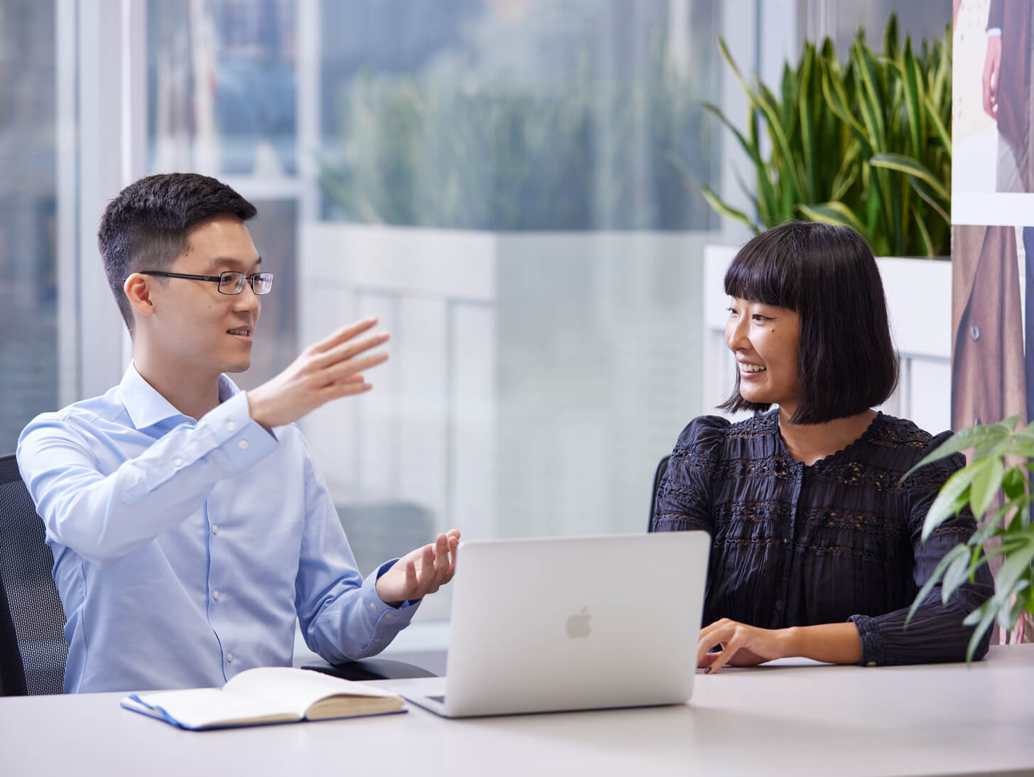 Two Employees Working Together 